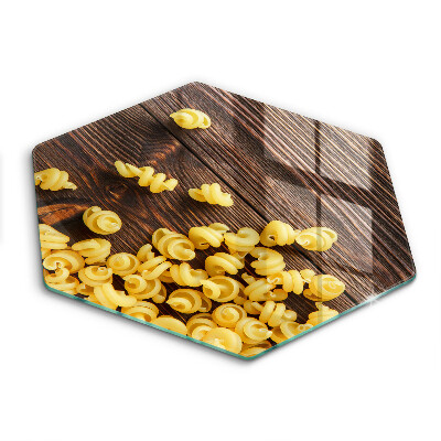 Üveg vágódeszka fényképpel hatszögletű Tészta az asztalon