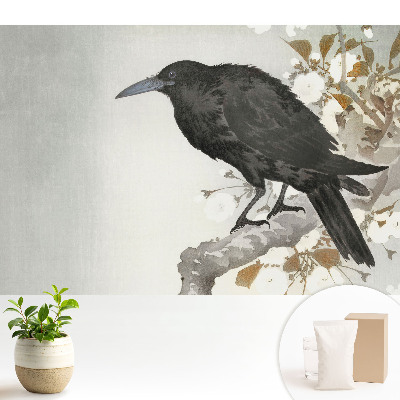 Dekor tapéta Egy finom holló a virágzó ágak hátterében