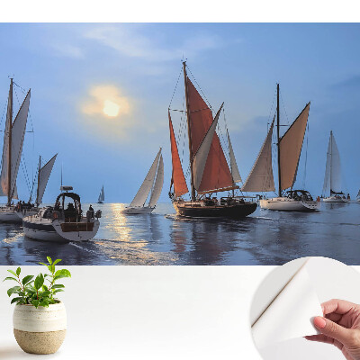 Tapéta Jachtok és naplemente a nyugodt tengeren