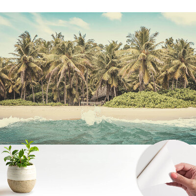 Öntapadós tapéta falra Egy trópusi paradicsom tele pálmafákkal és kék éggel