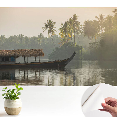 Modern tapéta Misztikus táj csónakkal és pálmafákkal