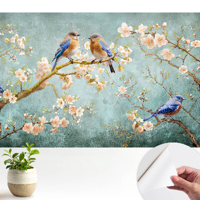 Tapéta Madarak virágzó ágakon pasztell minta