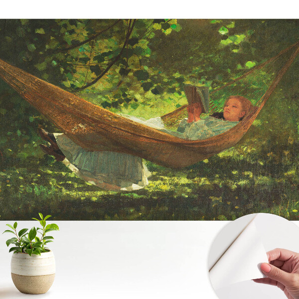 Öntapadós tapéta Egy lány függőágyban a fák alatt