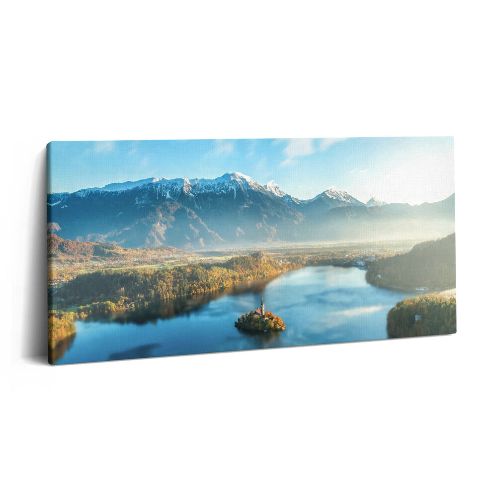 Vászonfotó 100x50 Épület a hegyekben lévő tavon