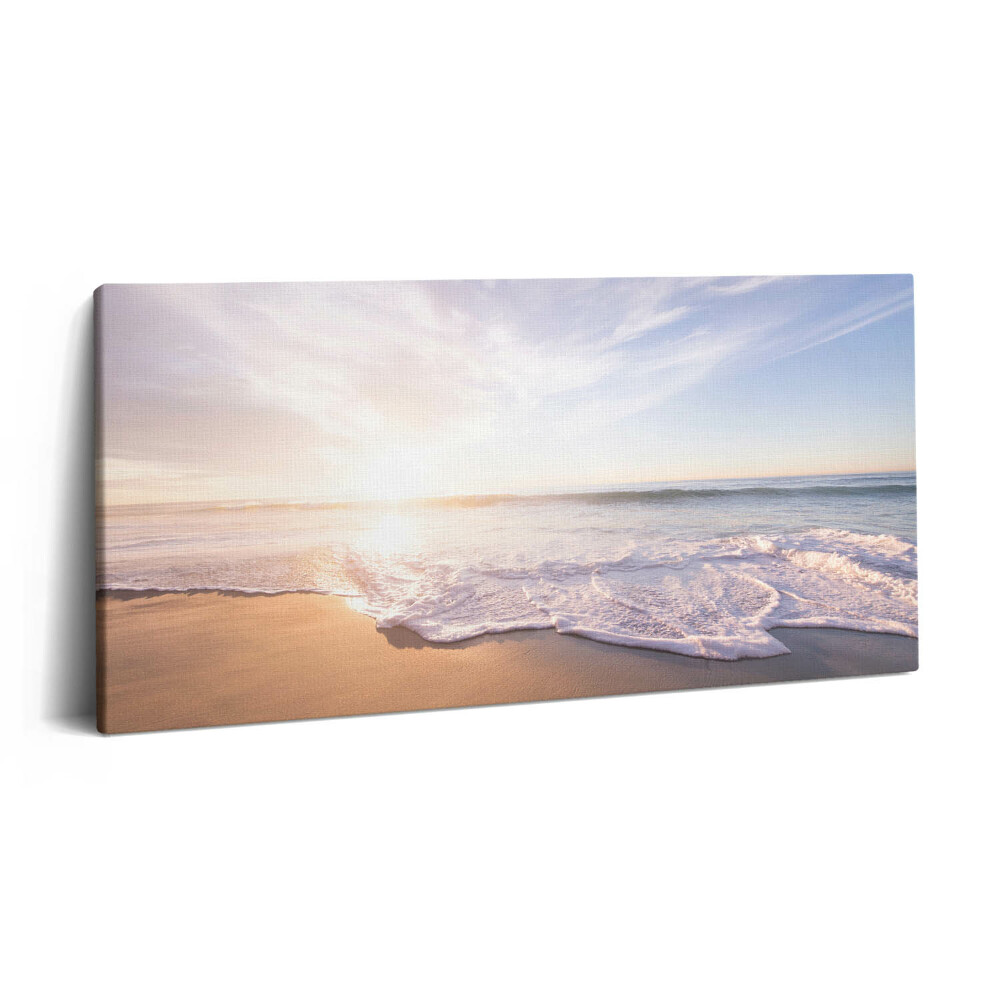 Vászonfotó 100x50 Napfelkelte a tengerparton és a tengeren