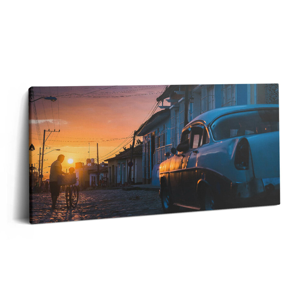 Vászonfotó 100x50 Naplemente és egy régi autó