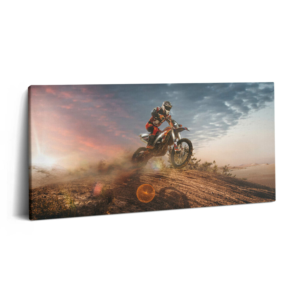 Vászonfotó 100x50 Ember motoron és a sivatagban