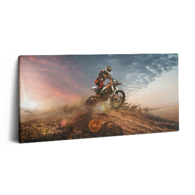Vászonfotó 100x50 Ember motoron és a sivatagban
