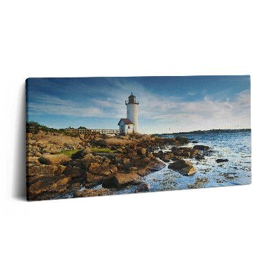 Vászonkép nyomtatás 120x60 Tájkép világítótorony sziklákkal és égbolt