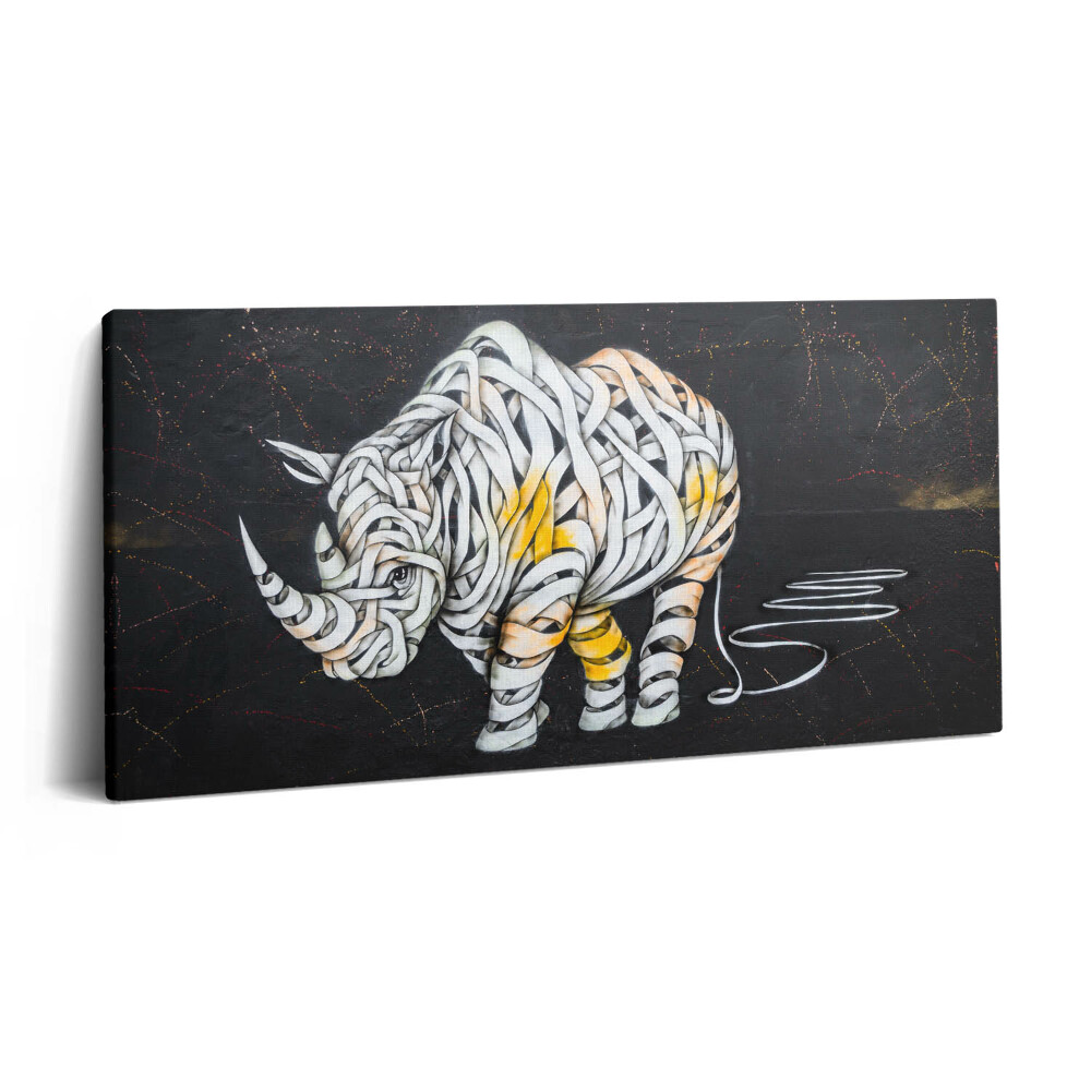 Vászonkép nyomtatás 120x60 Absztrakt nézet egy orrszarvúról és egy zenekarról