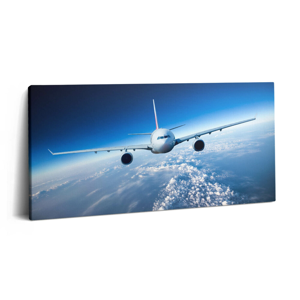 Vászonkép nyomtatás 120x60 Repülőgép a felhők felett