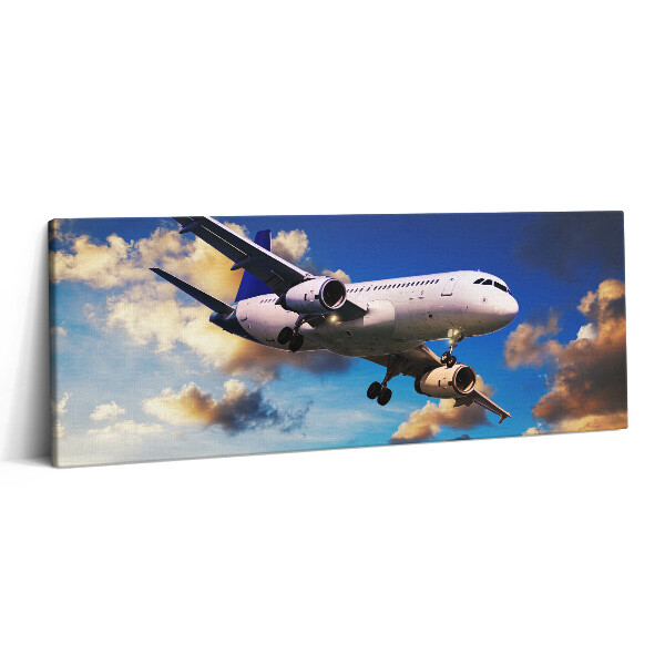 Canvas kép 125x50 Repülőgép a felhők között