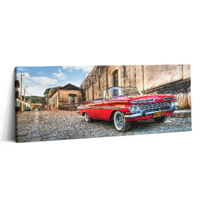 Canvas kép 125x50 Régi piros autó a kolumbiai negyedben