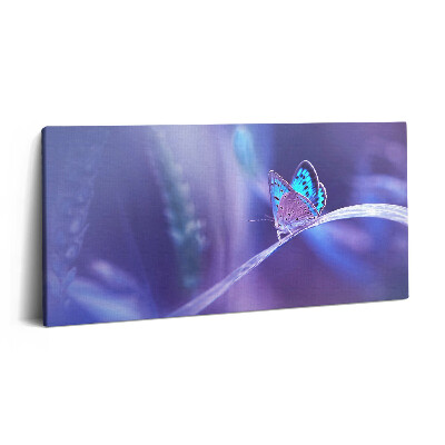 Vászonkép 140x70 Pillangó a fűben