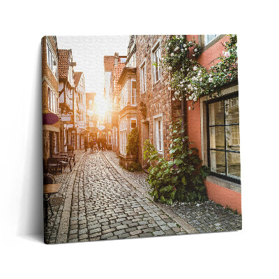 Vászonkép 60x60 Olasz utca épületek között