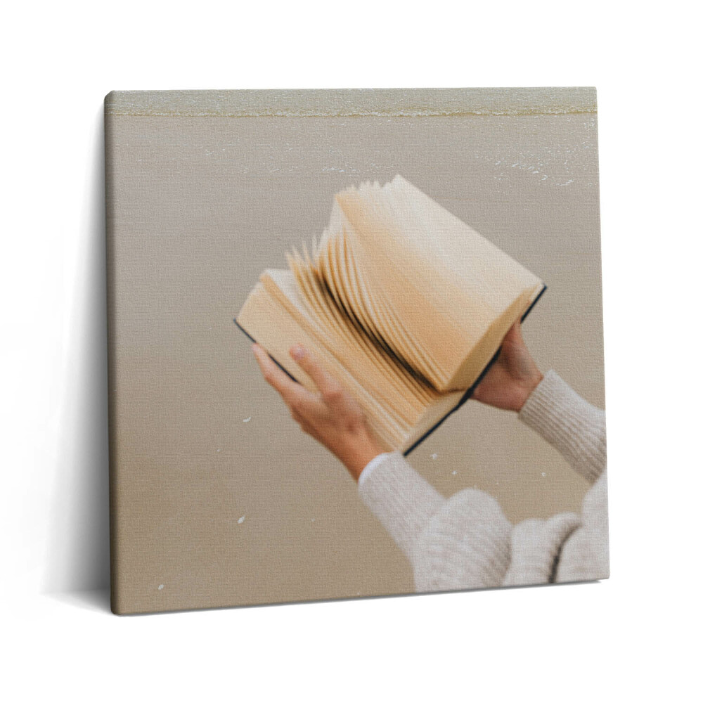 Vászonkép 60x60 Könyv a tengerparton