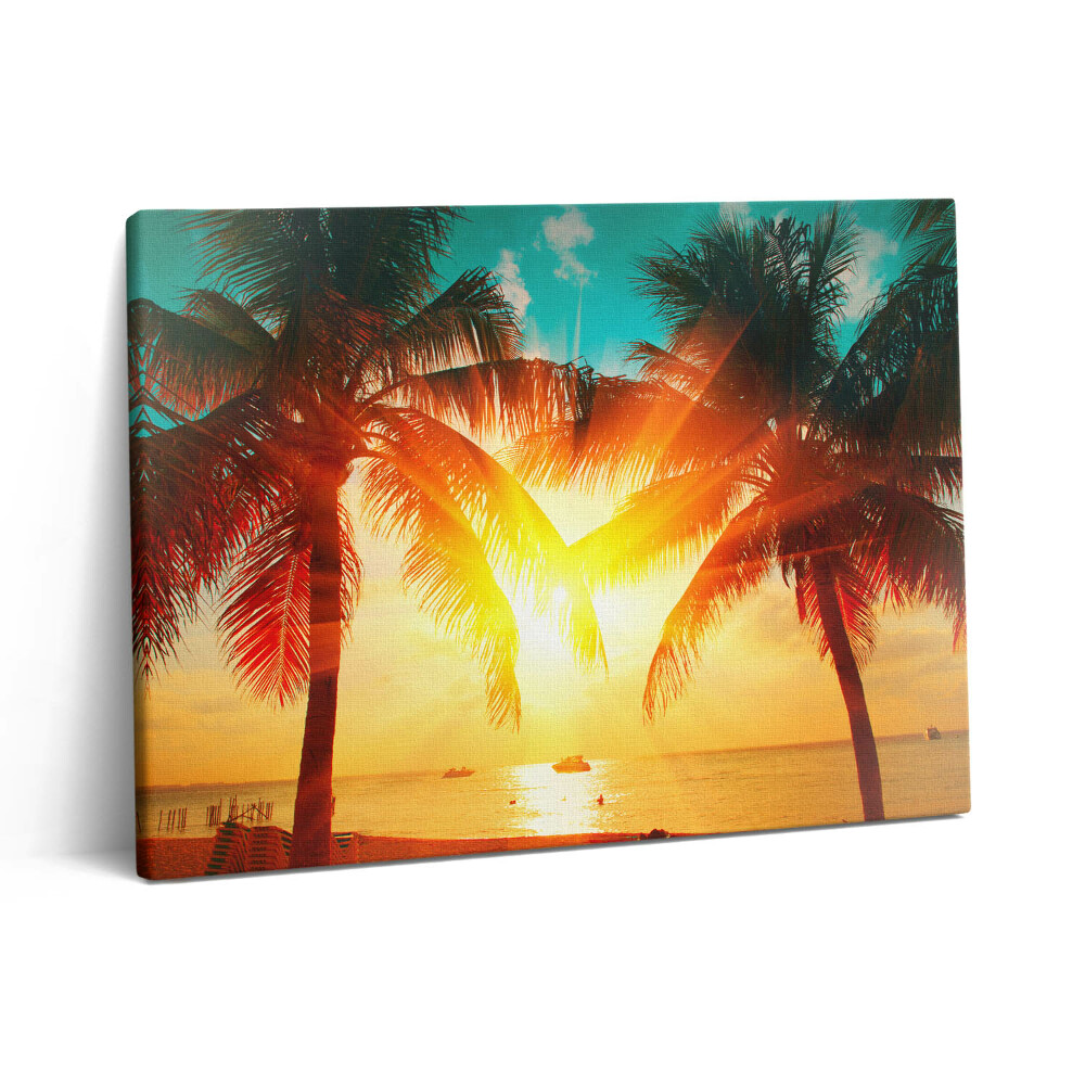 Vászonkép falra 80x60 Nyaralási kilátás - pálmafák naplementében