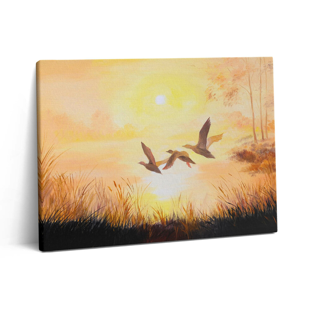 Vászonkép falra 80x60 Daruk naplementében