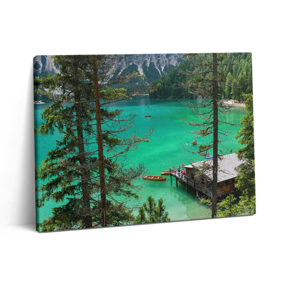 Vászonkép falra 80x60 Fából készült kenu a vízben