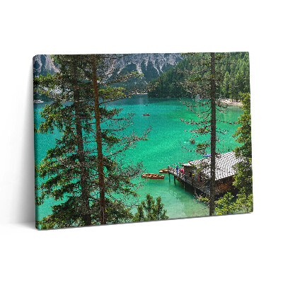 Vászonkép falra 80x60 Fából készült kenu a vízben