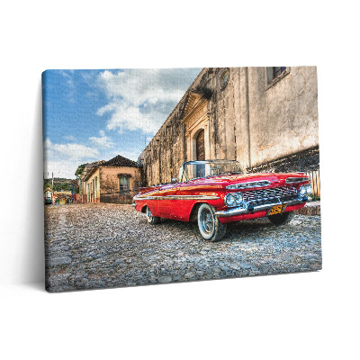 Vászonkép falra 80x60 Régi piros autó a kolumbiai negyedben