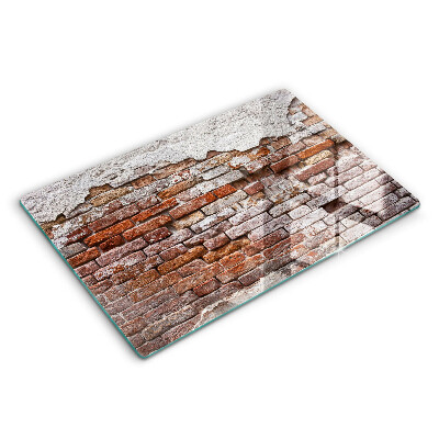 Üveg tűzhelyvédő 80x52 cm Régi téglafal és beton