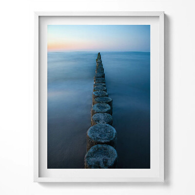 Kép keretben Tájkép egy tengerparti strandról és füvekről