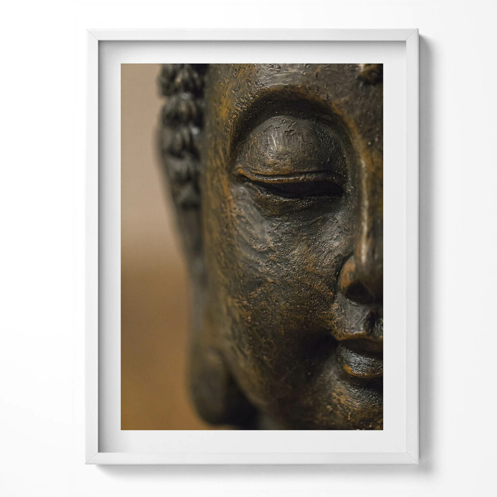 Kép keretben Egy Zen Buddha szobor arca