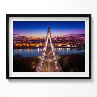 Kép keretben Híd városi tájjal és naplementével