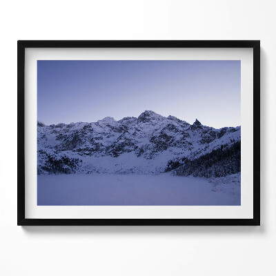 Kép keretben Havas hegycsúcsok és kék ég