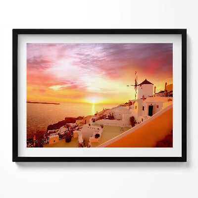 Kép keretben Naplemente fehér épületek szélmalom