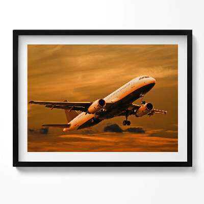 Kép keretben Repülőgép felszállása naplementében
