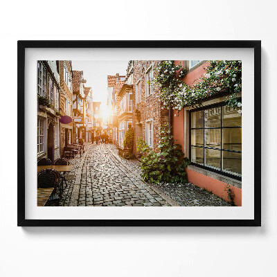 Kép keretben Kanyargós utca napfény régi házak