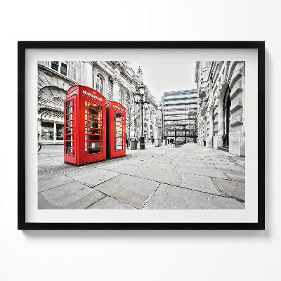 Kép keretben Piros telefonfülkék városi környezetben