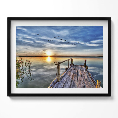 Kép keretben Naplemente vízparti hídon