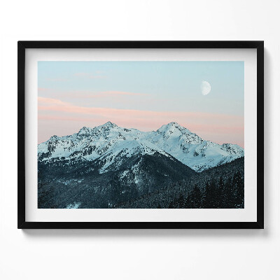 Kép keretben Havas hegyek naplementében