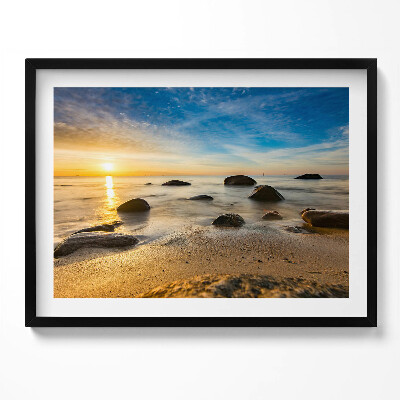 Kép keretben Nyugodt tengerpart kövek és naplemente