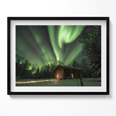 Kép keretben Északi fény egy faház felett