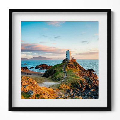 Keretezett falikép Világítótorony sziklán naplementében