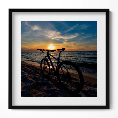 Keretezett falikép Naplemente kerékpárral a tengerparton