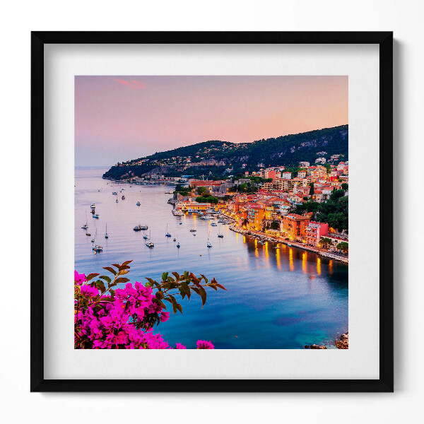 Keretezett falikép Tengerparti városkép naplementében