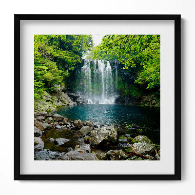 Keretezett falikép Zöld dombok vízesés tiszta tó