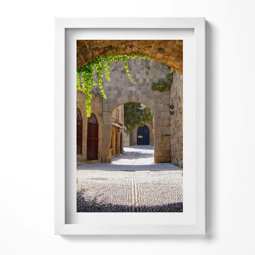 Keretezett kép Középkori városkapu macskaköves utca