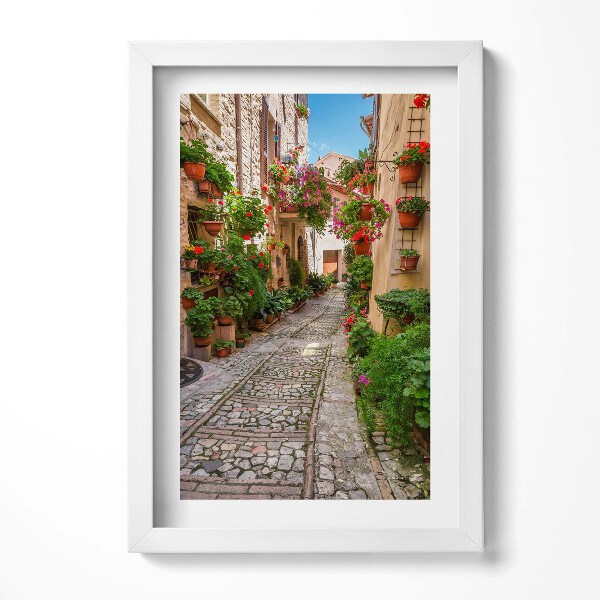 Keretezett kép Virágos kanyargós utcácska