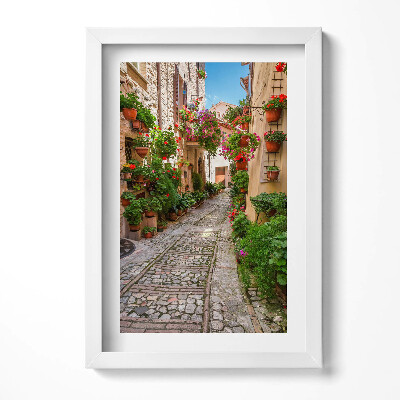 Keretezett kép Virágos kanyargós utcácska