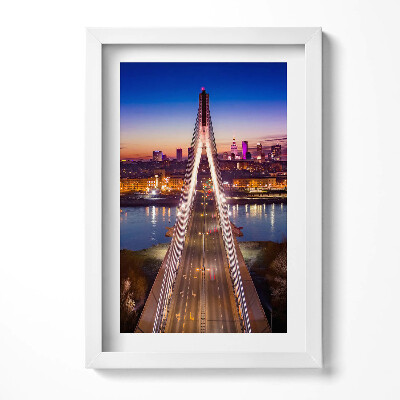 Keretezett kép Híd városi tájjal és naplementével