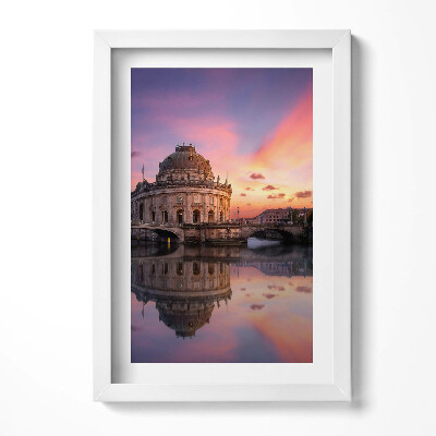 Keretezett kép Színes naplemente vízparti épület