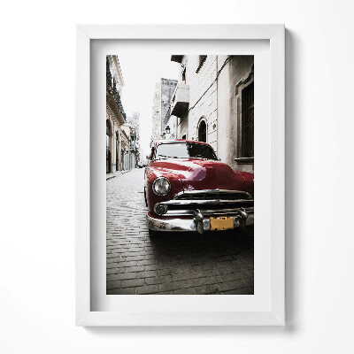 Keretezett kép Régi piros autó egy keskeny utcában