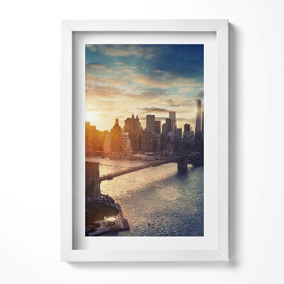 Keretezett kép Naplemente városi tájjal