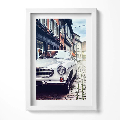 Keretezett kép Fehér klasszikus autó városi utca